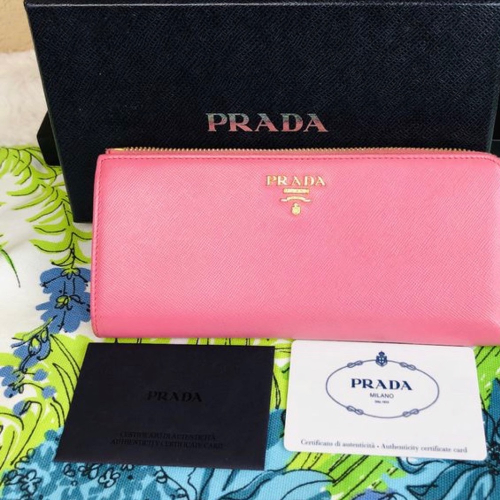 Prada pink zippy wallet